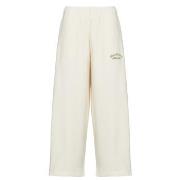 Jogging housut / Ulkoiluvaattee New Balance  LINEAR HERITAGE FLEECE BA...