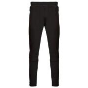Jogging housut / Ulkoiluvaattee Puma  EVOSTRIPE CORE Pants  US L