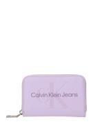 Calvin Klein Jeans Kukkaro  lila / laventeli