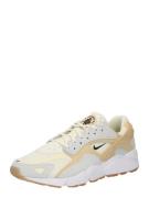 Nike Sportswear Matalavartiset tennarit 'AIR HUARACHE'  kerma / tummab...