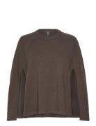 Cuallida Poncho Brown Culture