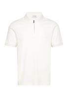 Liquid Touch Welt Zip Polo Cream Calvin Klein