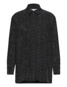 Runsas Piirto Unikko Black Marimekko