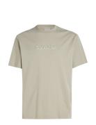 Shadow Embossed Logo T-Shirt Tops T-shirts Short-sleeved Beige Calvin ...