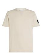 Badge Regular Tee Tops T-shirts Short-sleeved Cream Calvin Klein Jeans