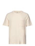 Akkikki Struture Tee Tops T-shirts Short-sleeved Beige Anerkjendt