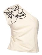 Asymmetrical Flower-Embroidered Top Tops T-shirts & Tops Short-sleeved...