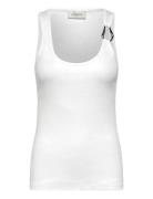 Cmsiv-To Is A Tight-Fitting Top In A Thick, Ribbed Material With A Lot...