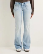 Nelly - Sininen - Super Low Heart Pocket Bootcut Jeans